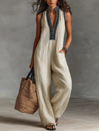 Fiamma - Mouwloze jumpsuit met minimalistische hoge kraag en rits