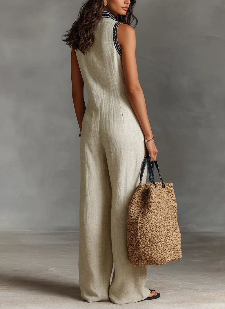Fiamma - Mouwloze jumpsuit met minimalistische hoge kraag en rits