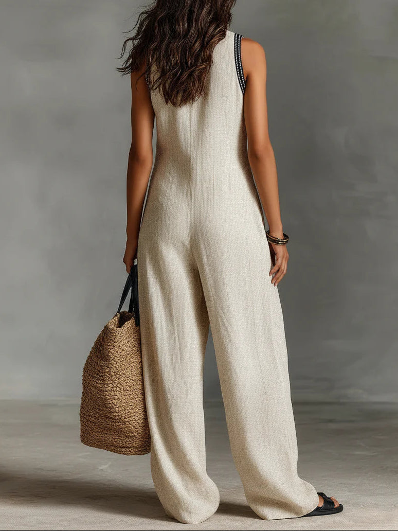 Fiamma - Mouwloze jumpsuit met minimalistische hoge kraag en rits