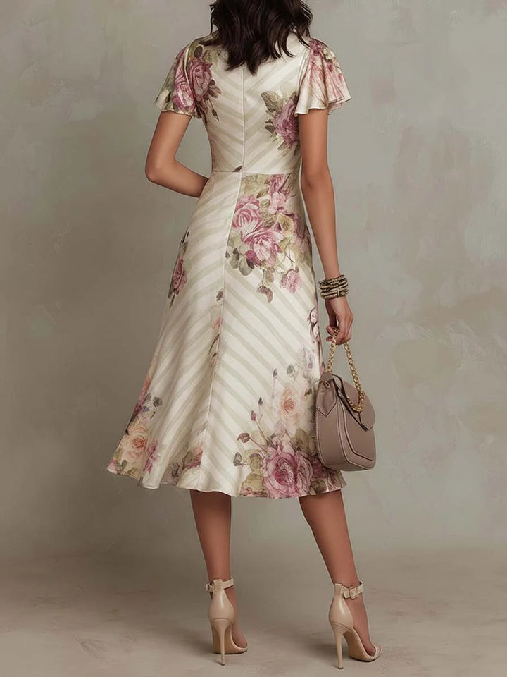Alba - Elegante retro midi jurk in bloemmotief satijn