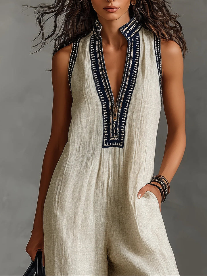 Fiamma - Mouwloze jumpsuit met minimalistische hoge kraag en rits