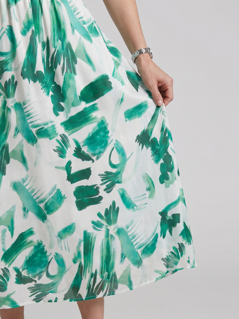 Paula | Midikleed met pofmouwen en V-hals