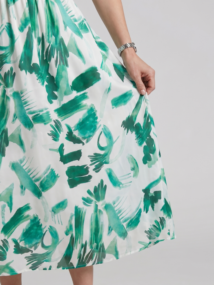 Paula | Midikleed met pofmouwen en V-hals