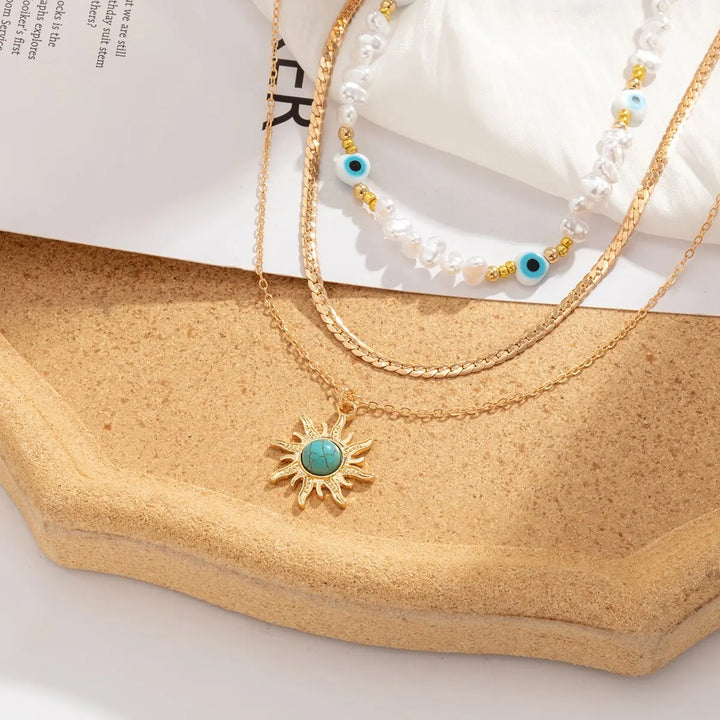 Set van Gelaagde Kettingen Parel & Boze Oog – Boho Zonnehanger