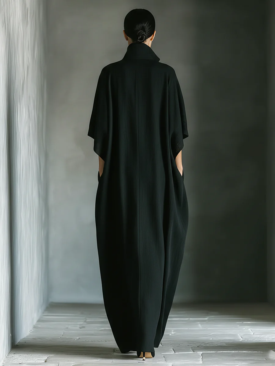 Alessandra™ | Lange zwarte oversized minimalistische jurk met kimono mouwen