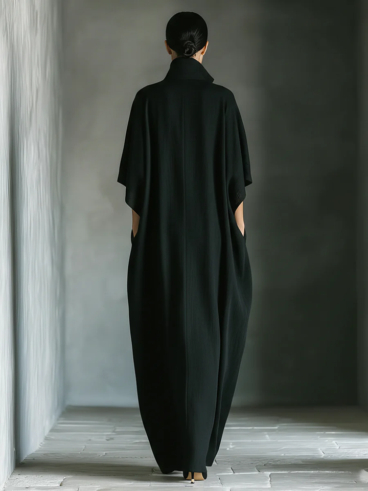 Alessandra™ | Lange zwarte oversized minimalistische jurk met kimono mouwen
