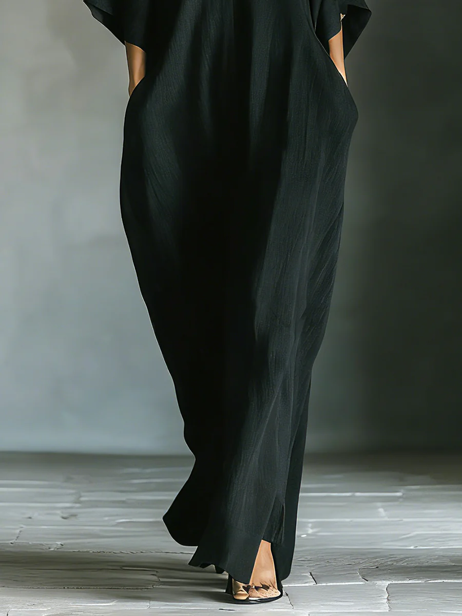 Alessandra™ | Lange zwarte oversized minimalistische jurk met kimono mouwen