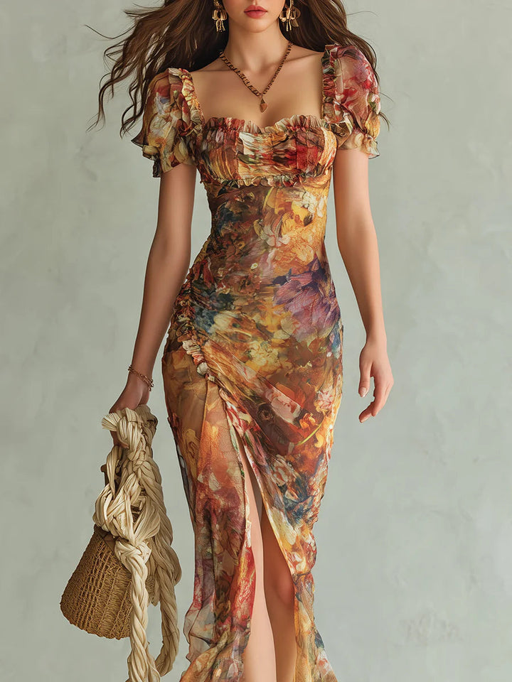 Viola - Lange jurk van oranje chiffon met bohemien olieverfprint