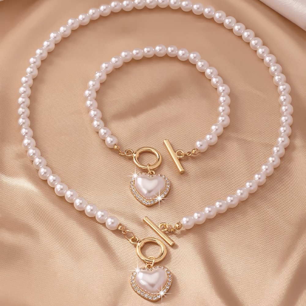 Set van armband en ketting met hartvormige hanger van 2 stuks