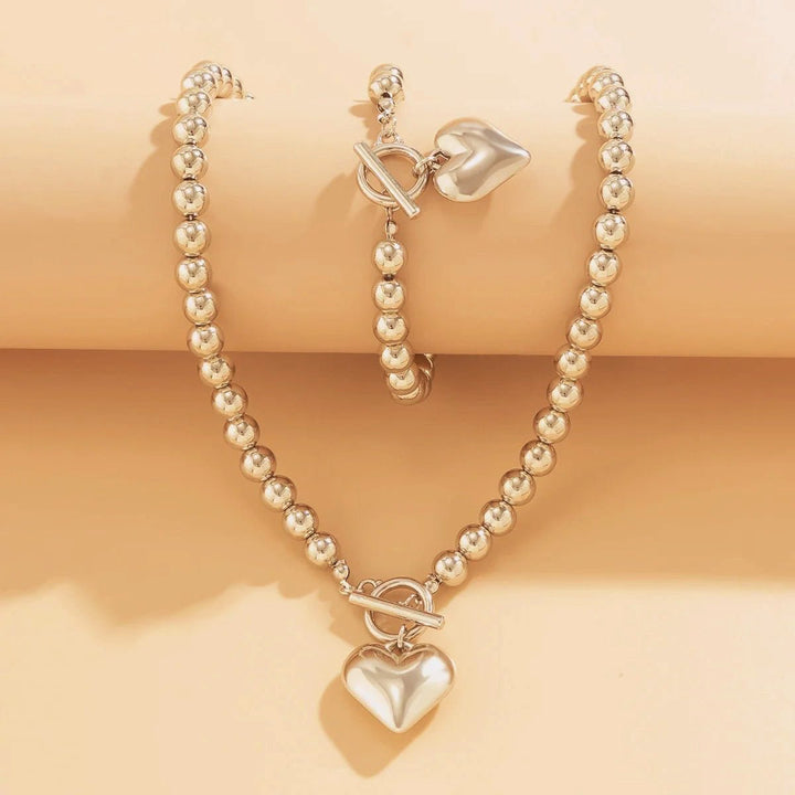 Set van armband en ketting met hartvormige hanger van 2 stuks